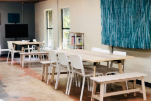 Tables and chairs in a coworking space. Coworking & working vacations